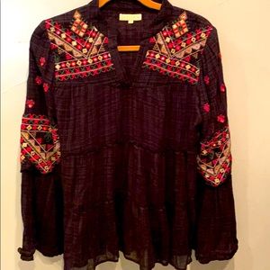 Beautifully embroidered black swing top